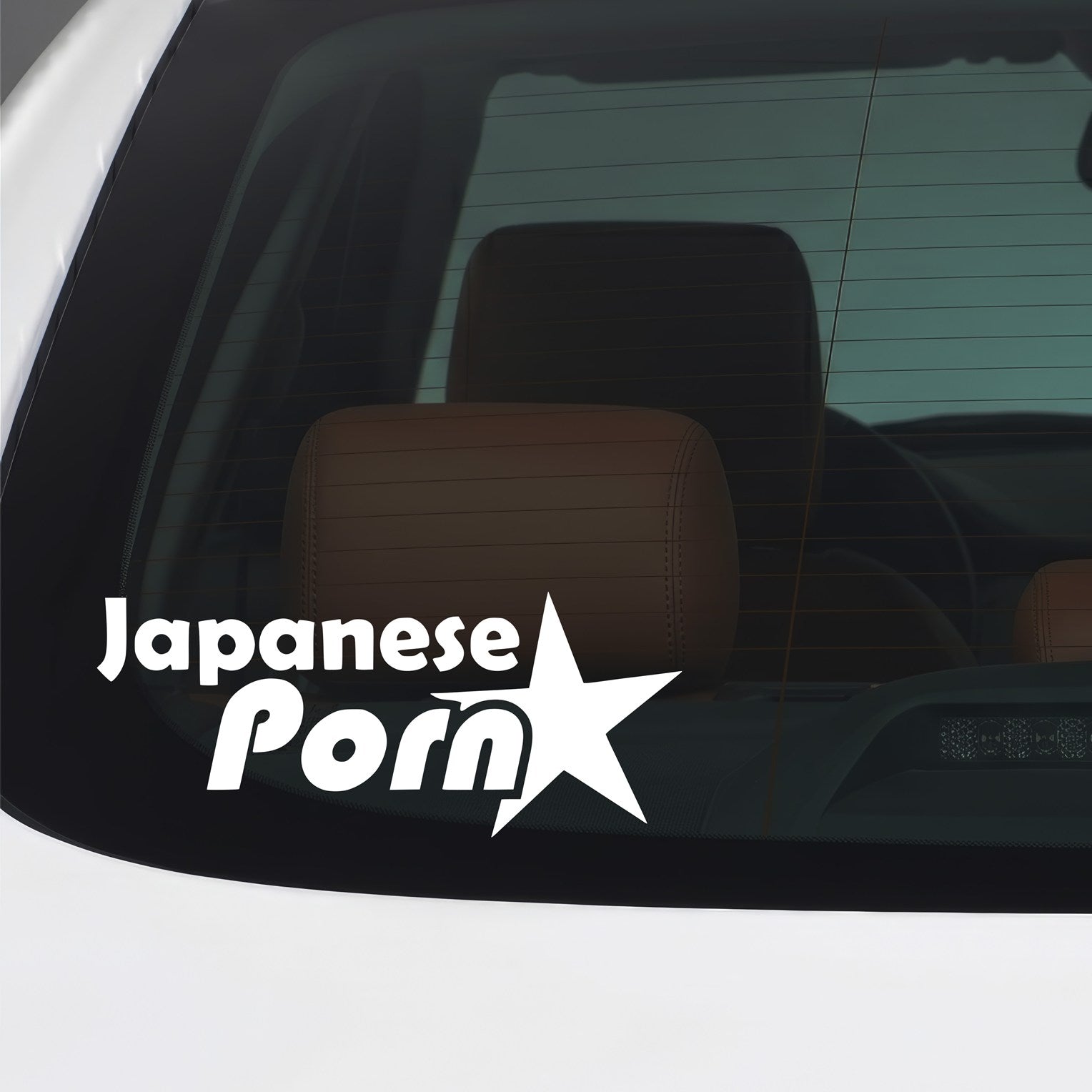 White Japanese Porn sticker applied to a car window.