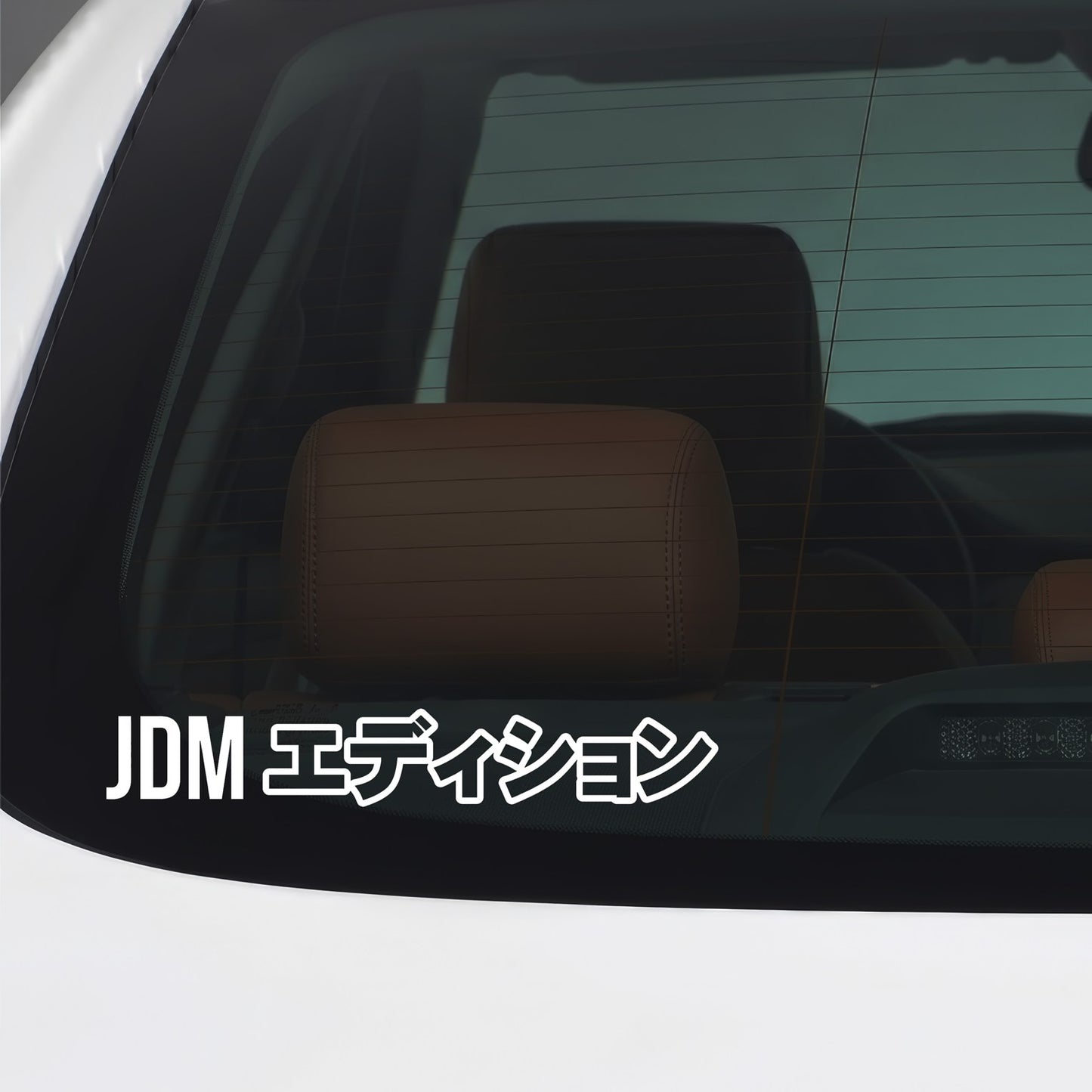 White JDM import kanji sticker applied to a car window.