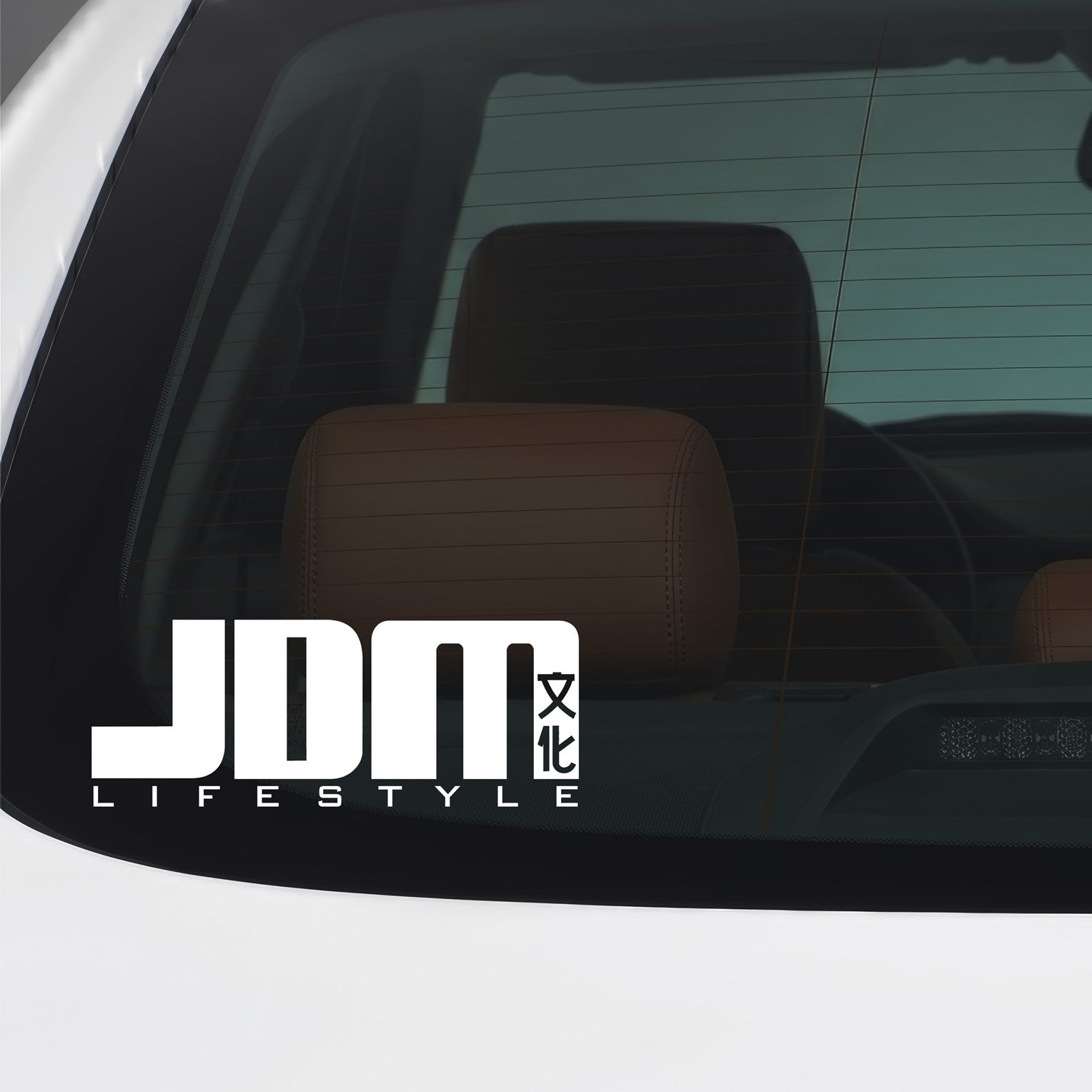 White JDM Lifestyle sticker applied to a car window.