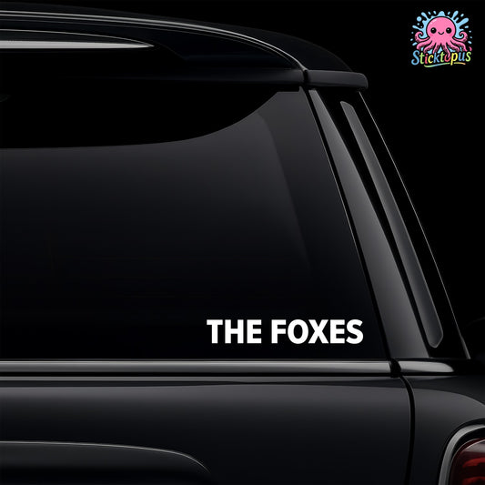 Car window with 'The Foxes' decal and Sticktopus logo.