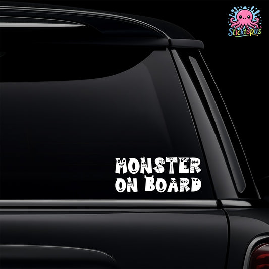 Car window with 'Monster on Board' decal and Sticktopus logo.