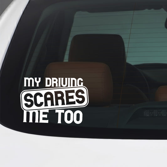 White 'My driving scares me too' retro sticker applied to a car window.