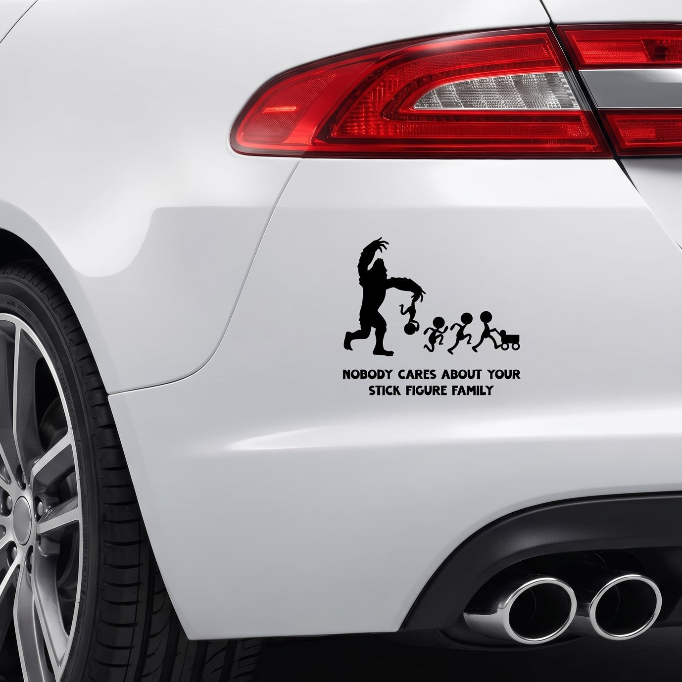 Black Nobody Cares Stick Figure Family Bigfoot sticker applied to a car bumper.