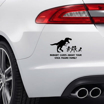 Black Nobody Cares About Your Stick Figure Family T-Rex sticker applied to a car rear bumper.