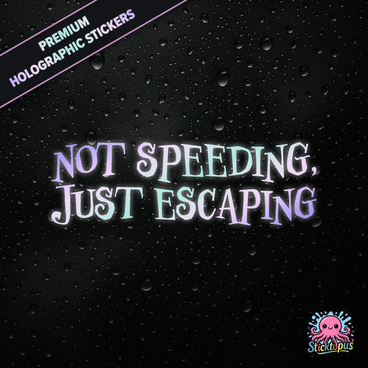 Premium holographic sticker with the phrase “NOT SPEEDING, JUST ESCAPING” in bold, pastel-shifting text on a black background with water droplets.