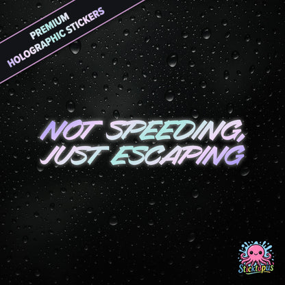 Premium holographic sticker with the phrase “NOT SPEEDING, JUST ESCAPING” in bold, pastel-shifting text on a black background with water droplets.
