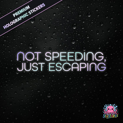 Premium holographic sticker with the phrase “NOT SPEEDING, JUST ESCAPING” in bold, pastel-shifting text on a black background with water droplets.