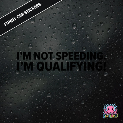 I’m Not Speeding. I’m Qualifying! — motorsport-themed sticker in black text, racing humour.