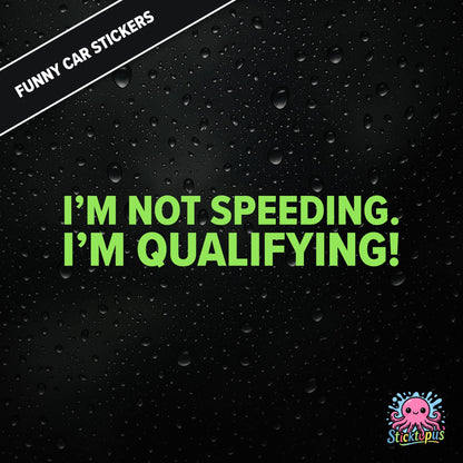 I’m Not Speeding. I’m Qualifying! — motorsport-themed sticker in green text, racing humour.