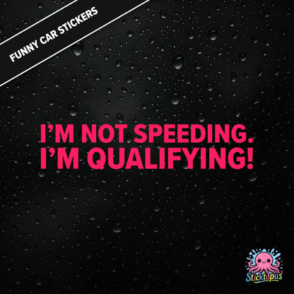 I’m Not Speeding. I’m Qualifying! — motorsport-themed sticker in pink text, racing humour.