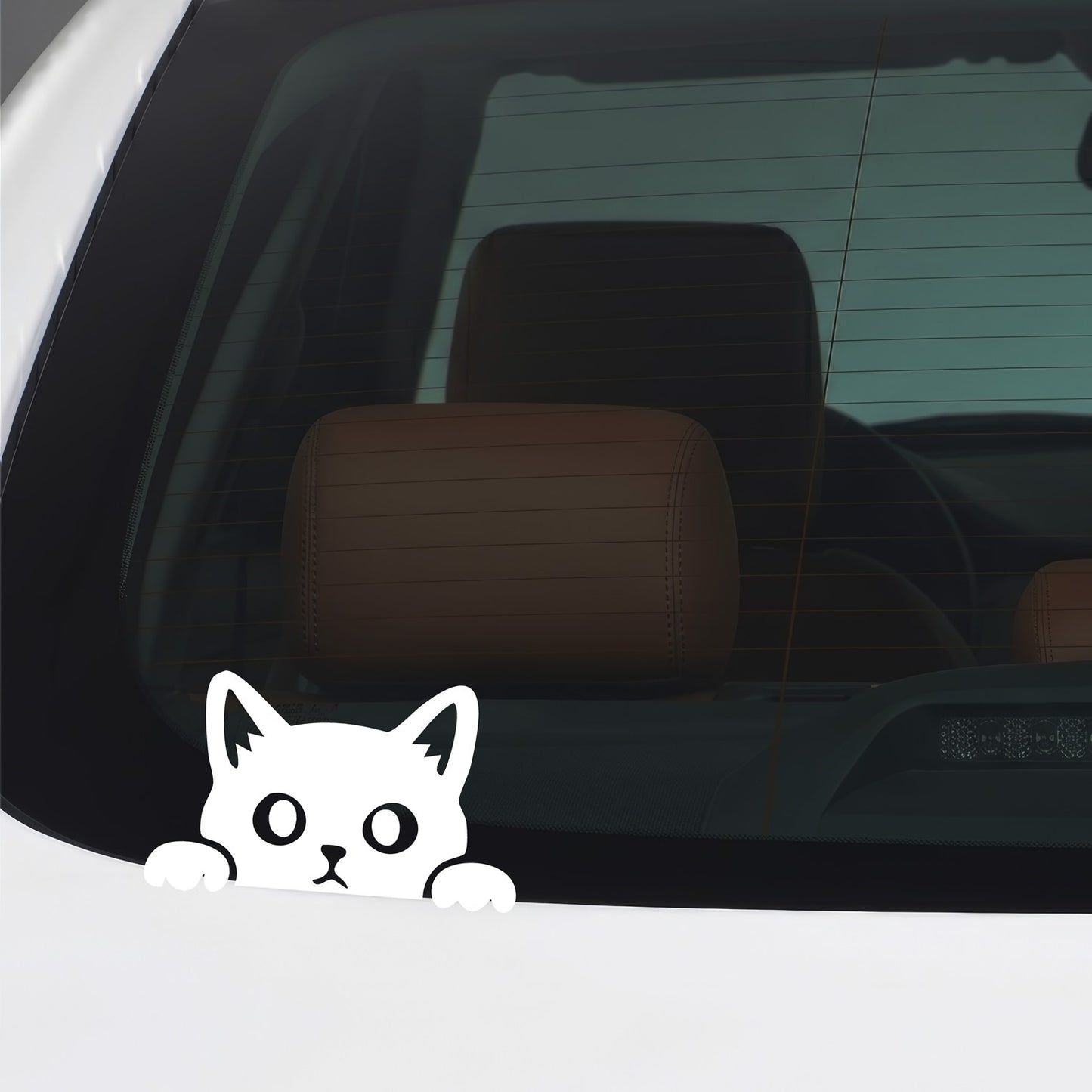 White peeking cat vinyl sticker applied to a car window.