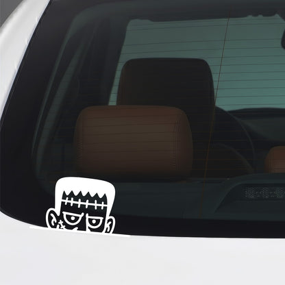 White peeking Frankenstein vinyl sticker applied to a car window.