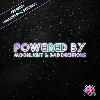Premium holographic sticker with the phrase “POWERED BY MOONLIGHT & BAD DECISIONS” in bold, pastel-shifting text on a black background with water droplets.