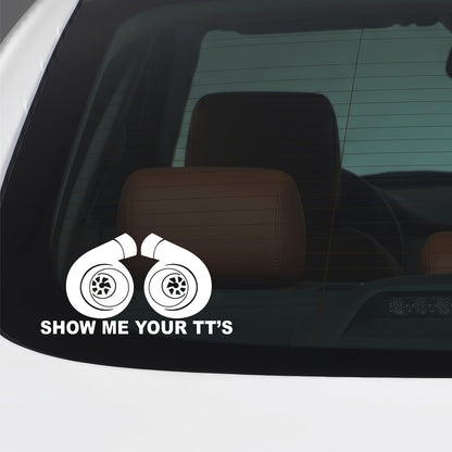 White Show Me Your TTs sticker applied to a car window.