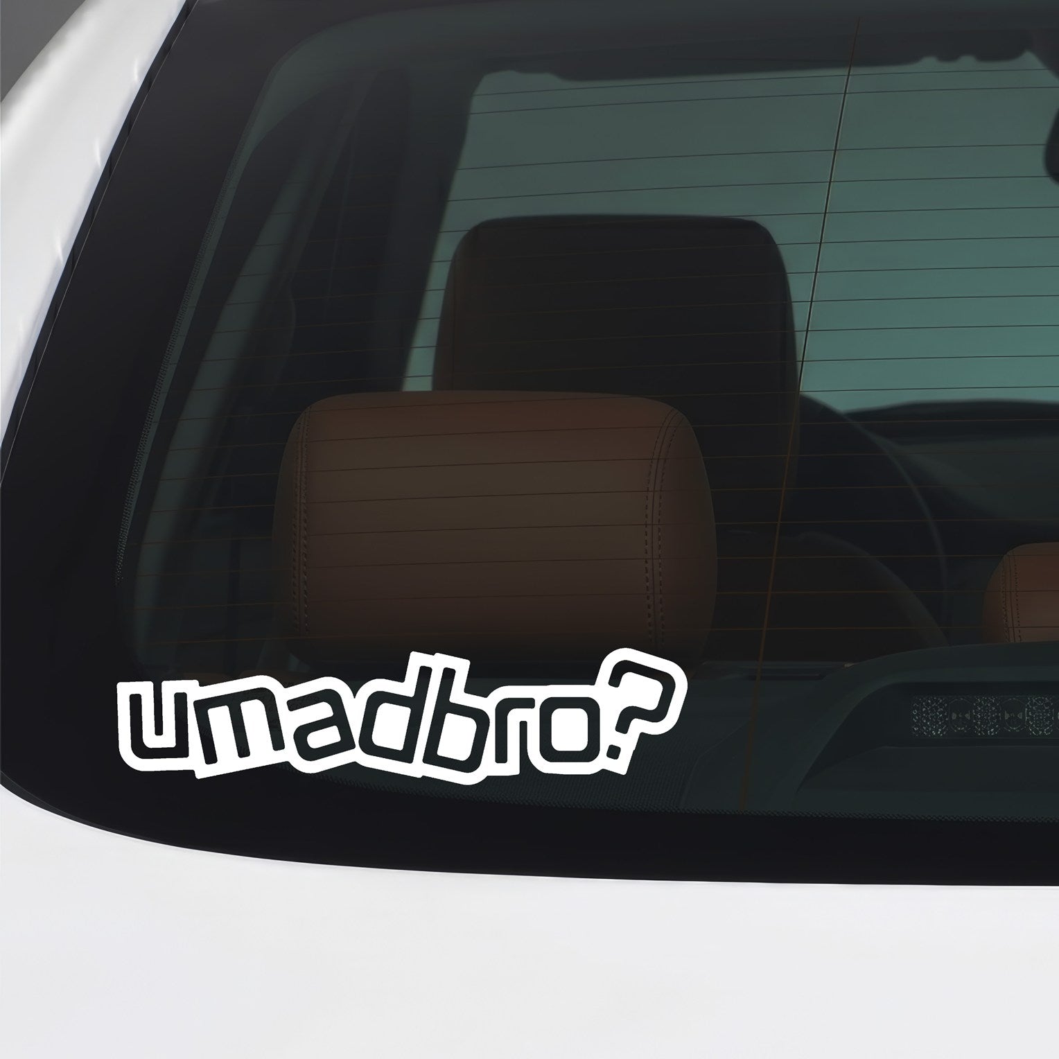 White U Mad Bro sticker applied to a car window.