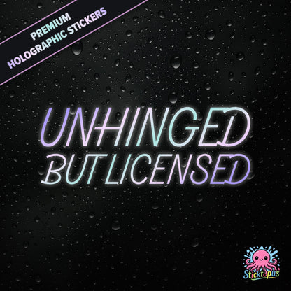Premium holographic sticker with the phrase “UNHINGED BUT LICENSED” in bold, colour-shifting text on a black background with water droplets.