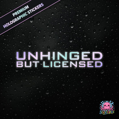Premium holographic sticker with the phrase “UNHINGED BUT LICENSED” in bold, colour-shifting text on a black background with water droplets.