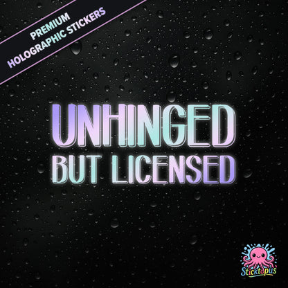 Premium holographic sticker with the phrase “UNHINGED BUT LICENSED” in bold, colour-shifting text on a black background with water droplets.