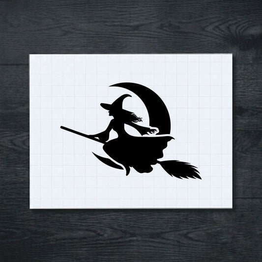 Black witch riding a broom before a crescent moon vinyl sticker
